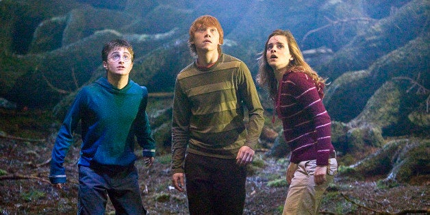** FILE ** In this image originally released by Warner Bros., Daniel Radcliff, portraying Harry Potter, left, Rupert Grint, p