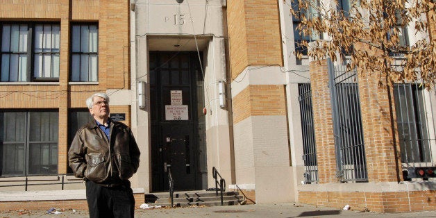 FILE- In this Dec. 1, 2011 file photo, Bronx Household of Faith co-pastor Robert Hall poses for a portrait in front of P.S. 1