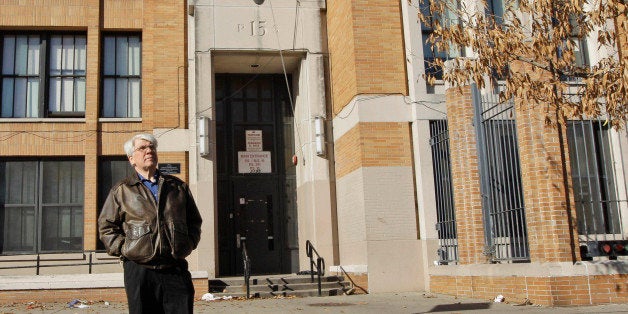 FILE- In this Dec. 1, 2011 file photo, Bronx Household of Faith co-pastor Robert Hall poses for a portrait in front of P.S. 15 in the Bronx borough of New York. The 2nd U.S. Circuit Court of Appeals ruled on Friday, Feb. 17, 2012, that the Bronx Household of Faith can continue to meet at a public school, at least temporarily. It is the only church permitted to hold services at a New York City public school while its constitutional challenge to the city's ban is being considered. (AP Photo/Mary Altaffer, File)