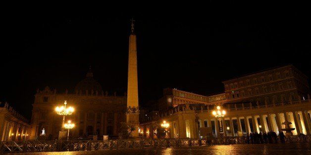 The lights of St Peter's Basilica are turned off as part of the Earth Hour campaign on March 28, 2015 at the Vatican. Millions are expected to take part around the world in the annual event organised by conservation group WWF, with hundreds of well-known sights set to plunge into darkness. AFP PHOTO / ALBERTO PIZZOLI (Photo credit should read ALBERTO PIZZOLI/AFP/Getty Images)
