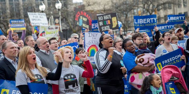 INDIANAPOLIS, IN - MARCH 30: Demonstrators gather outside the City County Building on March 30, 2015 in Indianapolis, Indiana. The group called on the state house to roll back the controversial Religious Freedom Restoration Act, which critics say can be used to discriminate against gays and lesbians. (Photo by Aaron P. Bernstein/Getty Images)