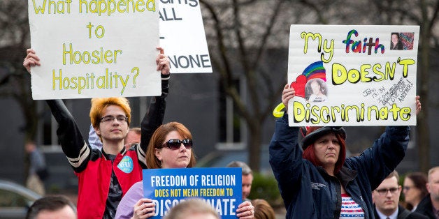 INDIANAPOLIS, IN - MARCH 30: Demonstrators gather outside the City County Building on March 30, 2015 in Indianapolis, Indiana. The group called on the state house to roll back the controversial Religious Freedom Restoration Act, which critics say can be used to discriminate against gays and lesbians. (Photo by Aaron P. Bernstein/Getty Images)