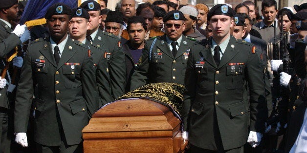 The casket of Army Spc. Azhar Ali is carried by the Color Guard after a prayer services at the Masjid Al-Mamoor Jamaica Muslim Center, Friday, March 18, 2005 in the Queens borough of New York. Ali, 27, a Pakistani-American was killed Wednesday, March 2, in Baghdad when an explosive detonated near his vehicle. He was assigned to the National Guard's 1st Battalion, 69th Infantry Regiment in New York. (AP Photo/Ramin Talaie)