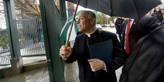 Salvatore Cordileone, the Roman Catholic archbishop of San Francisco, walks through a gate to Sacred Heart Cathedral Preparat