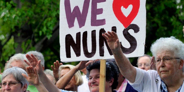 Supporters of The Leadership Conference of Women Religious participate in a vigil Thursday, Aug. 9, 2012 in St. Louis. The largest U.S. group for Roman Catholic nuns meet to decide how they should respond to a Vatican rebuke and order for reform. The LCWR, represents most of the 57,000 American nuns. (AP Photo/Seth Perlman)