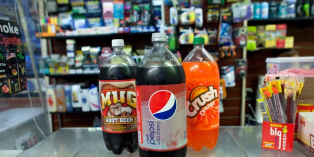 NEW YORK, NY - MARCH 11: Large soda bottles are seen in a bodega in Chinatown March 11, 2013 New York City. Today a New York state judge halted a controversial ban on large sugary drinks in places that serve prepared food that was to take effect tomorrow. (Photo illustration by Allison Joyce/Getty Images)