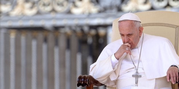 Pope Francis gestures as he attends the weekly general audience in St Peter's square at the Vatican on April 22, 2015. AFP PHOTO / FILIPPO MONTEFORTE (Photo credit should read FILIPPO MONTEFORTE/AFP/Getty Images)