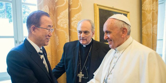 Pope Francis shakes hands with U.N. Secretary-General Ban Ki-moon during their meeting at the Vatican, Tuesday, April 28, 2015. The U.N. chief praised Pope Francis on Tuesday for framing climate change as an urgent moral imperative, saying his upcoming encyclical combined with a new round of U.N. climate talks in Paris provide an "unprecedented opportunity" to create a more sustainable future for the planet. (AP Photo/L'Osservatore Romano/Pool Photo via AP)