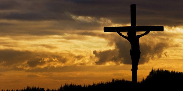 Silhouette of Jesus Christ crucifixion on cross on Good Friday Easter