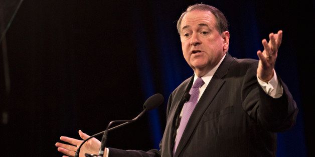 Mike Huckabee, former governor of Arkansas, speaks during the Iowa Freedom Summit in Des Moines, Iowa, U.S., on Saturday, Jan. 24, 2015. The talent show that is a presidential campaign began in earnest Saturday as more than 1,200 Republican activists, who probably will vote in Iowa's caucuses, packed into a historic Des Moines theater to see and hear from a parade of their party's prospective entries. Photographer: Daniel Acker/Bloomberg via Getty Images 