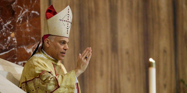 Salvatore J. Cordileone gives a blessing sing during a ceremony to install him as the new archbishop of San Francisco at the Cathedral of St. Mary of the Assumption in San Francisco, Thursday, Oct. 4, 2012. (AP Photo/Marcio Jose Sanchez, Pool)