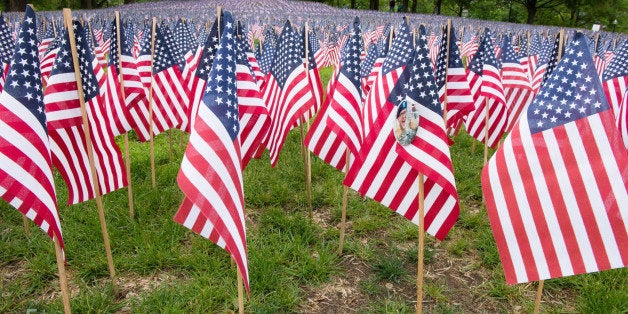 This garden of 37,000 flags was planted in honor of every fallen Massachusetts service member from the Revolutionary war tp t