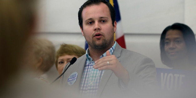 FILE - In this Aug. 29, 2014, file photo, Josh Duggar, executive director of FRC Action, speaks in favor the Pain-Capable Unborn Child Protection Act at the Arkansas state Capitol in Little Rock, Ark. Tony Perkins, president of the Washington-based Christian lobbying group, said Thursday, May 21, 2015, that he has accepted the resignation of Duggar in the wake of the reality TV star's apology for unspecified bad behavior as a young teen. (AP Photo/Danny Johnston, File)