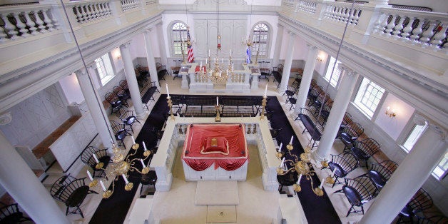 In this Thursday, May 28, 2015 photo Touro Synagogue, the nation's oldest, is seen from the "ladies gallery" in Newport, R.I. Women attend synagogue seated on the second floor while men take their places on the ground floor. A federal judge has allowed the state of Rhode Island to intervene in a fight over the future of the synagogue by a lawsuit, due for trial Monday, June 1, which pits the nation's first Jewish congregation in New York City against the congregation that worships at the 250-year-old Touro Synagogue. (AP Photo/Stephan Savoia)