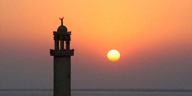 In this Sunday, Dec. 12, 2010 photo, a minaret of mosque, at sunset in the Laaft village of the Qeshm island, which lies at t
