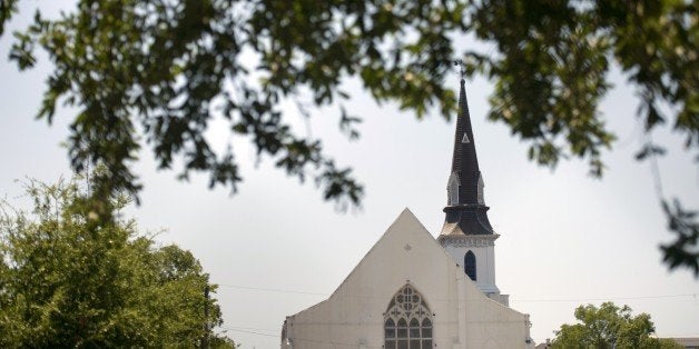 A view ofthe Emanuel AME Church is seen June 18, 2015 in Charleston, South Carolina, after a mass shooting at the church on the evening of June 17, 2015. US police on Thursday arrested a 21-year-old white gunman suspected of killing nine people at a prayer meeting in one of the nation's oldest black churches in Charleston, an attack being probed as a hate crime. The shooting at the Emanuel African Methodist Episcopal Church in the southeastern US city was one of the worst attacks on a place of worship in the country in recent years, and comes at a time of lingering racial tensions. AFP PHOTO/BRENDAN SMIALOWSKI (Photo credit should read BRENDAN SMIALOWSKI/AFP/Getty Images)