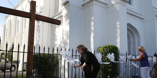 CHARLESTON, SC - JUNE 18: Ribbons are placed on the fence in front of the Emanuel African Methodist Episcopal Church after a