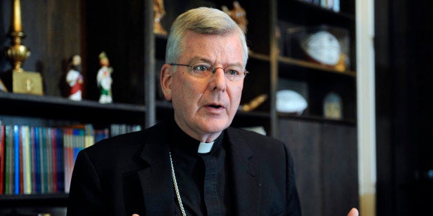 FILE - In this July 30, 2014, file photo, St. Paul-Minneapolis Archbishop John Nienstedt speaks at his office in St. Paul, Mi