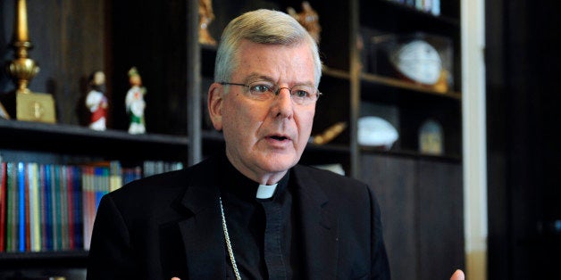 FILE - In this July 30, 2014, file photo, St. Paul-Minneapolis Archbishop John Nienstedt speaks at his office in St. Paul, Minn. On Monday, June 15, 2015, the Vatican said Pope Francis accepted the resignations of Nienstedt and Auxiliary Bishop Lee Anthony Piche after prosecutors charged the archdiocese with having failed to protect children from unspeakable harm from a pedophile priest. (AP Photo/Craig Lassig, File)