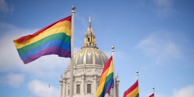 Rainbow flags fly in front of San Francisco City Hall on Wednesday, June 26, 2013, shortly after the U.S. Supreme Court decision that cleared the way for same-sex marriage in California. The justices issued two 5-4 rulings in their final session of the term. One decision wiped away part of a federal anti-gay marriage law that has kept legally married same-sex couples from receiving tax, health and pension benefits. The other was a technical legal ruling that said nothing at all about same-sex marriage, but left in place a trial court's declaration that California's Proposition 8 is unconstitutional. (AP Photo/Noah Berger)