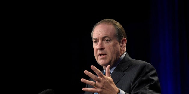 Republican presidential candidate, former Arkansas Gov. Mike Huckabee addresses attendees during Rick Scott's Economic Growth Summit in Lake Buena Vista, Fla., Tuesday, June 2, 2015. (AP Photo/Phelan M. Ebenhack)