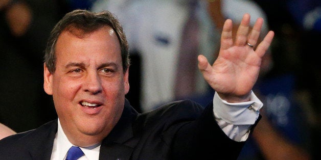 New Jersey Gov. Chris Christie waves to supporters during an event where he announced he would seek the Republican nomination for president, Tuesday, June 30, 2015, at Livingston High School in Livingston, N.J. (AP Photo/Julio Cortez)