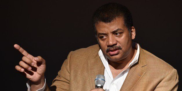 Neil deGrasse Tyson, astrophysicist, 'Cosmos' television show host and Frederick P. Rose Director of the Hayden Planetarium at the American Museum of Natural History speaks August 4, 2014 after a screening of James Cameron's 'Deepsea Challenge 3D' film at the museum in New York. AFP PHOTO/Stan HONDA (Photo credit should read STAN HONDA/AFP/Getty Images)