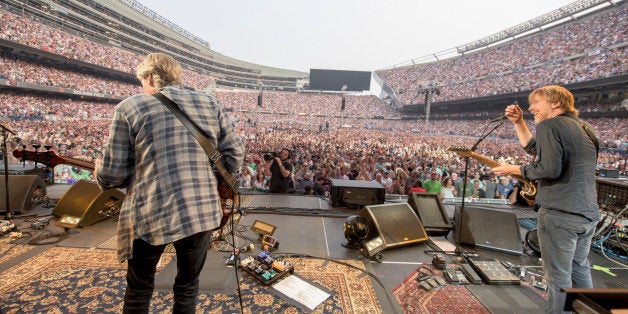 IMAGE DISTRIBUTED FOR THE GRATEFUL DEAD - Phil Lesh, Trey Anastasio of The Grateful Dead perform at Grateful Dead Fare Thee Well Show at Soldier Field on Sunday, July 5, 2015, in Chicago, Ill. (Photo by Jay Blakesberg/Invision for the Grateful Dead/AP Images)