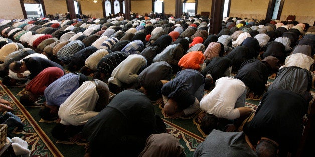 In this May 6, 2011 photo, Muslims pray at the Islamic Center of America in Dearborn, Mich. The killing of Osama bin Laden, a man who was America's face of evil for nearly a decade, left Christians, Jews and Muslims relieved, proud or even jubilant. For their religious leaders, it was sometimes hard to know just what to say about that. There is at least some dissonance between the values they preach and the triumphant response on the streets of New York and Washington to the death of a human being _ even one responsible for thousands of killings in those areas and around the world. (AP Photo/Paul Sancya)