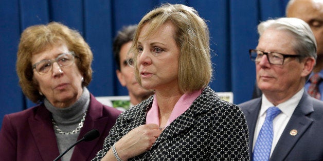 FILE - In this Wednesday, Jan. 21, 2015, file photo, Debbie Ziegler, center, the mother of Brittany Maynard, speaks in suppor