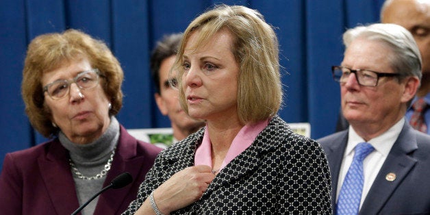 FILE - In this Wednesday, Jan. 21, 2015, file photo, Debbie Ziegler, center, the mother of Brittany Maynard, speaks in support of proposed legislation allowing doctors to prescribe life-ending medication to terminally ill patients during a news conference at the Capitol, in Sacramento, Calif. A bill, authored by Sen. Lois Wolk, D-Davis, left, and Sen. Bill Monning, D-Carmel, right, that would allow California physicians to help terminally ill patients end their lives, is struggling to muster enough support ahead of a legislative vote Tuesday, July 7, 2015. Maynard, a 29-year-old San Francisco Bay Area woman who had terminal brain cancer, moved to Oregon where she could legally end her life. (AP Photo/Rich Pedroncelli, File)