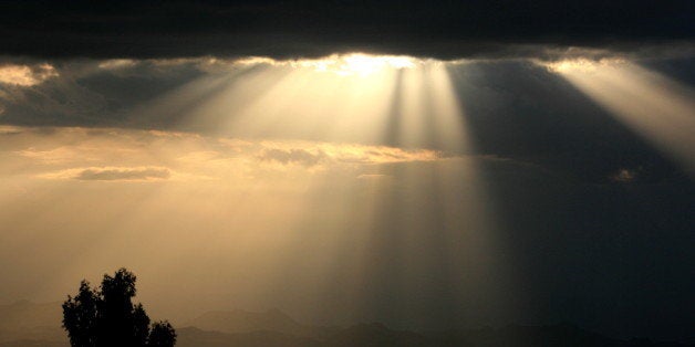 I saw these sunrays, and took this picture, just after visiting the mysterious Churches of Lalibela (Ethiopia), as the night