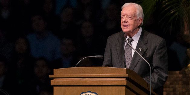 Former President Jimmy Carter speaks during the memorial service for Rev. Theodore Hesburgh on Wednesday, March 4, 2015, inside the Purcell Pavilion at the University of Notre Dame in South Bend, Ind. (AP Photo/South Bend Tribune, Robert Franklin, Pool)