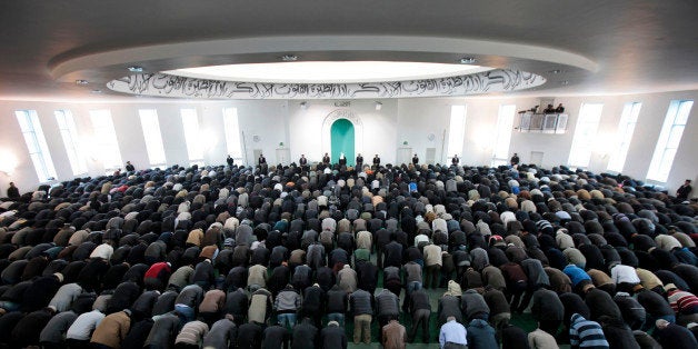 Worshippers from the Ahmadiyya Muslim community attend Friday prayers at the Baitul Futuh Mosque in south London, Friday, Feb. 18. 2011. According to the community, a sect of Islam that was founded in 1889 and represented in more than 180 countries, the mosque is the largest in western Europe. (AP Photo/Lefteris Pitarakis)