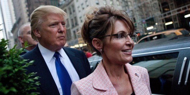 NEW YORK, NY - MAY 31: Former U.S. Vice presidential candidate and Alaska Governor Sarah Palin (R), and Donald Trump walk towards a limo after leaving Trump Tower, at 56th Street and 5th Avenue, on May 31, 2011 in New York City. Palin and Trump met for a dinner meeting in the city. (Photo by Andrew Burton/Getty Images)