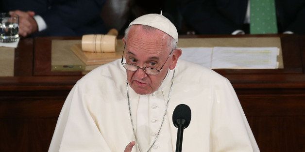 WASHINGTON, DC - SEPTEMBER 24: Pope Francis addresses a joint meeting of the U.S. Congress in the House Chamber of the U.S. Capitol on September 24, 2015 in Washington, DC. Pope Francis is the first pope to address a joint meeting of Congress and will finish his tour of Washington later today before traveling to New York City. (Photo by Mark Wilson/Getty Images)
