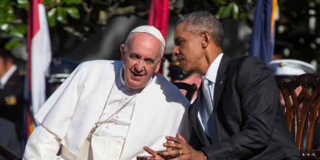 WASHINGTON, DC SEPTEMBER 23: His Holiness Pope Francis is welcomed by President Barack Obama during an arrival ceremony at the White House in Washington, D.C., on Wednesday, September 23, 2015. (Photo by Nikki Kahn/The Washington Post via Getty Images)