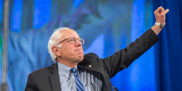 MANCHESTER, NH - SEPTEMBER 19: Democratic Presidential candidate Senator Bernie Sanders (I-VT) makes a fist while talking on stage during the New Hampshire Democratic Party State Convention on September 19, 2015 in Manchester, New Hampshire. Five Democratic presidential candidates are all expected to address the crowd inside the Verizon Wireless Arena. (Photo by Scott Eisen/Getty Images)