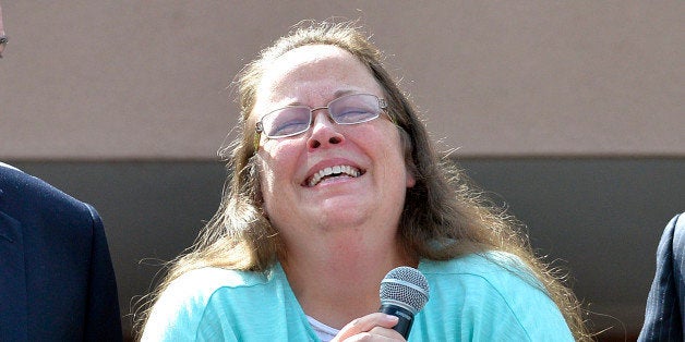 Rowan County Clerk Kim Davis pauses as she speaks after being released from the Carter County Detention Center, Tuesday, Sept. 8, 2015, in Grayson, Ky. Davis, the Kentucky county clerk who was jailed for refusing to issue marriage licenses to gay couples, was released Tuesday after five days behind bars. (AP Photo/Timothy D. Easley)