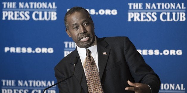 Republican presidential candidate Ben Carson speaks as he discuss his new book 'A More Perfect Union: What We the People Can Do To Reclaim Our Constitutional Liberties' October 9, 2015 at the National Press Club in Washington, DC. Republican White House hopeful Ben Carson said he stood by controversial comments linking gun control to the Holocaust, as he argued for arming staff in schools to prevent future mass shootings. AFP Photo/PAUL J. RICHARDS (Photo credit should read PAUL J. RICHARDS/AFP/Getty Images)