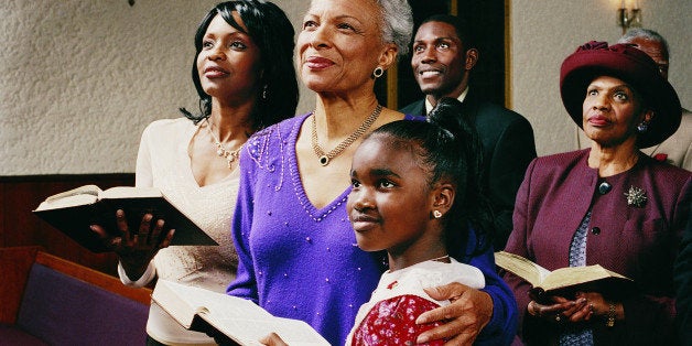 Family Standing in Church Pews Holding Bibles and Listening to a Service