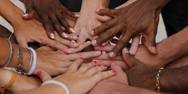 Diverse human hands showing unity