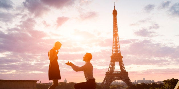 Romantic marriage proposal at Eiffel Tower, Paris, France