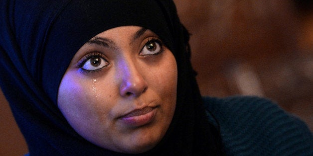 Rabia, 17, a veiled woman victim of agression in the street on May 20, speaks during a press conference on June 22, 2013 in Argenteuil, Paris suburb. A Collective against Islamophobia in France called for a demonstration today in the city of Argenteuil. AFP PHOTO / MIGUEL MEDINA (Photo credit should read MIGUEL MEDINA/AFP/Getty Images)