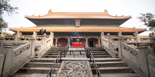 QUFU, SHANDONG PROVINCE, CHINA - 2015/03/19: Dragon carved stone steps leading to Dacheng Hall, also called the Hall of Great