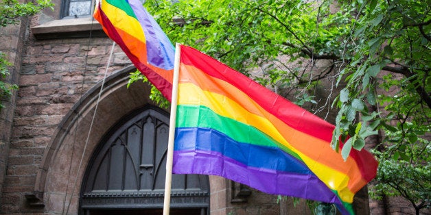 Rainbow flags proudly displayed at the church of ascention in manhattan on 5th avenue.