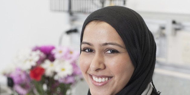 Middle Eastern nurse wearing hijab in hospital