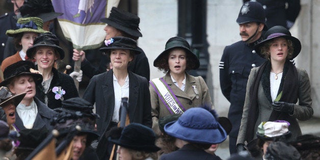 LONDON, ENGLAND - APRIL 11: Actors (L-R) Anne-Marie Duff, Carey Mulligan, Helena Bonham Carter and Romola Garai take part in filming of the movie Suffragette at Parliament on April 11, 2014 in London, England. This is the first time filming for a movie has been allowed in The Houses of Parliament. Suffragette is due for release in 2015. (Photo by Peter Macdiarmid/Getty Images)