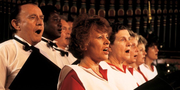 women and men singing in a church choir