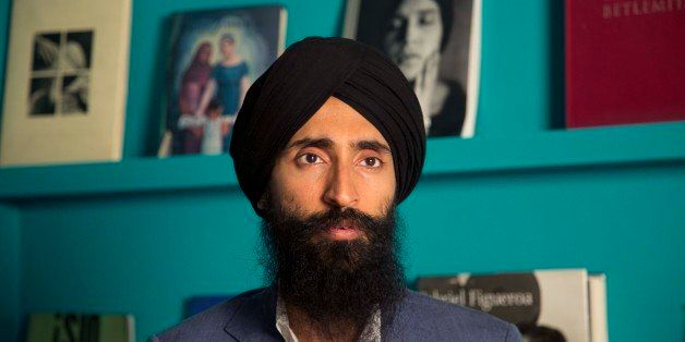 Waris Ahluwalia, a member of the Sikh community, gives an interview in Mexico City, Tuesday, Feb. 9, 2016. The Indian-American actor and designer who wasn't allowed to board a Mexico City-to-New York flight after refusing to remove his turban said Tuesday that he is satisfied with an apology from the airline. Ahluwalia said he is now waiting for Aeromexico to implement special training on how to treat Sikh passengers, for whom the headgear carries deep religious significance. (AP Photo/Eduardo Verdugo)